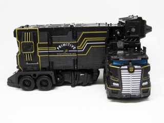 Hasbro Transformers Primitive Skateboarding Optimus Prime and Shreddicus Maximus Action Figure