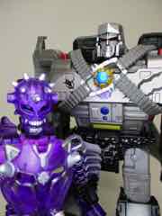 Hasbro Transformers Generations War for Cybertron Trilogy Spoilers Inside Action Figure Set (Megatron with Fossilizer Skelivore)